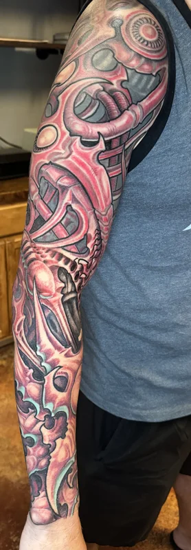 Biomechanical full sleeve tattoo by Aaron Sangenitto at Tattooz Ink in Redding, California