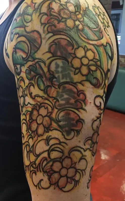 Cover-up tattoo by Aaron Sangenitto at Tattooz Ink in Redding, California