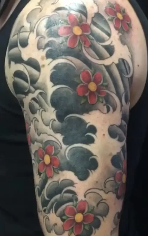 Cover-up tattoo by Aaron Sangenitto at Tattooz Ink in Redding, California