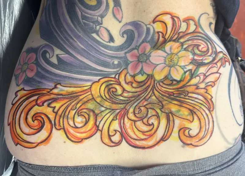 Cover-up tattoo by Aaron Sangenitto at Tattooz Ink in Redding, California