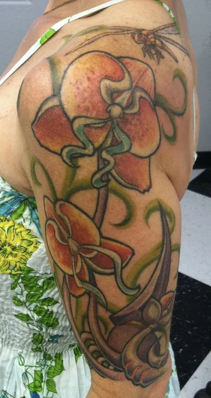 Custom floral tattoo by Aaron Sangenitto at Tattooz Ink in Redding, California