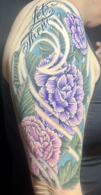 Custom floral tattoo by Aaron Sangenitto at Tattooz Ink in Redding, California