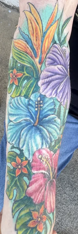 Custom floral tattoo by Aaron Sangenitto at Tattooz Ink in Redding, California